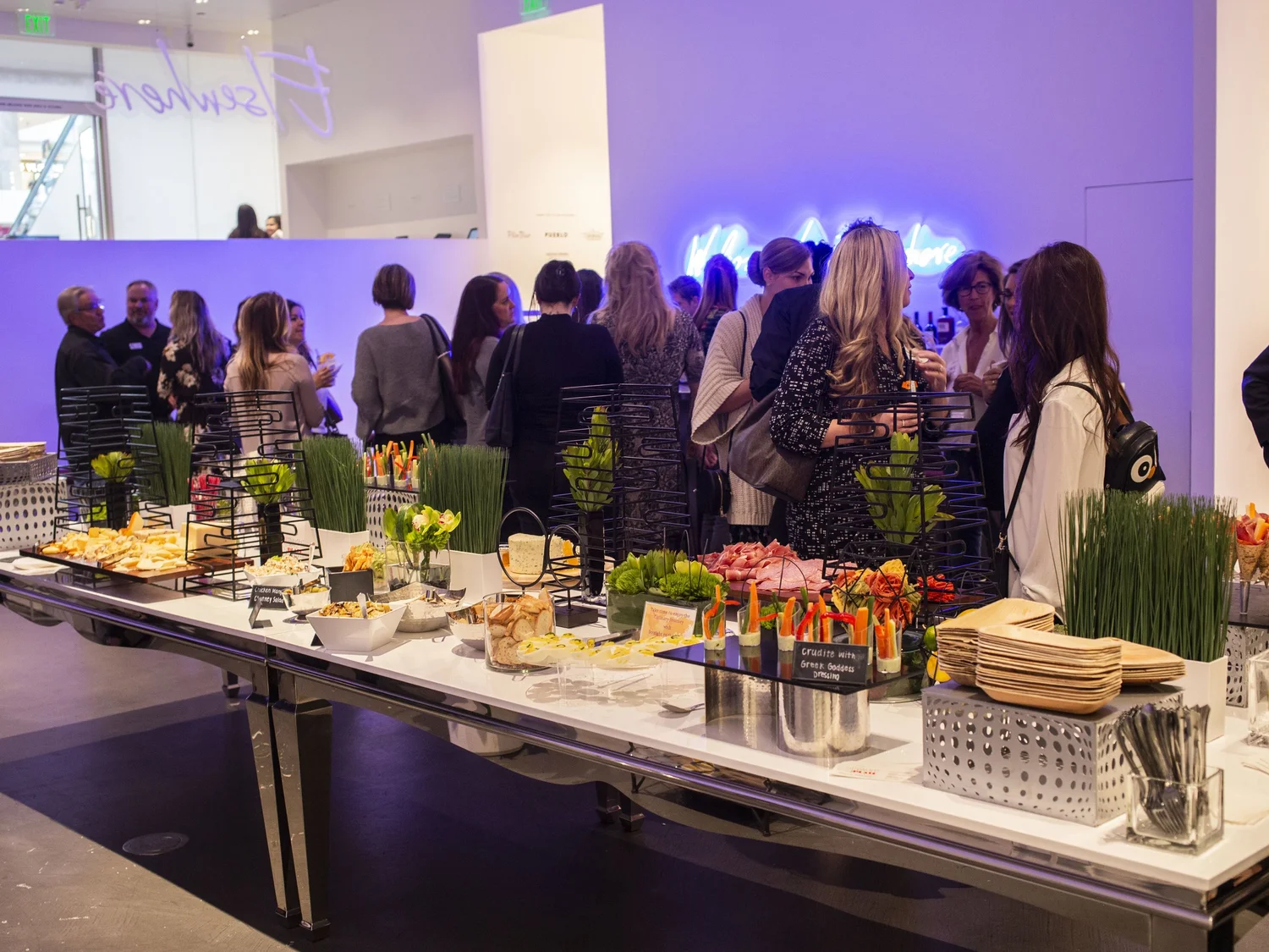 Guests mingling at a private event inside Wonderspaces
