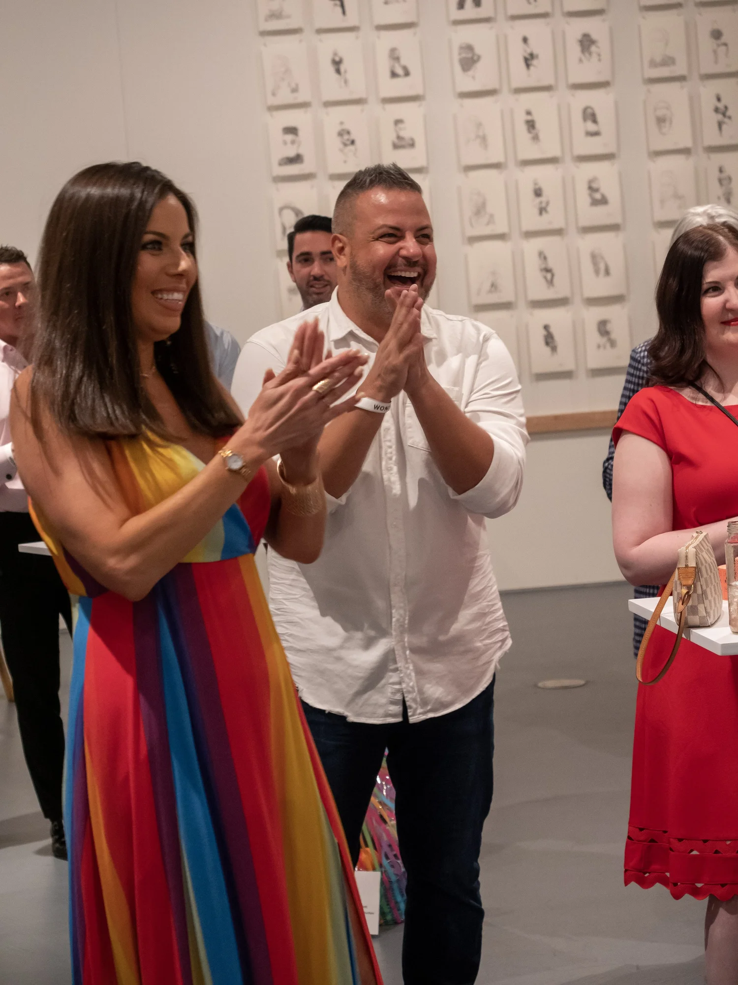Guests enjoying artwork during a private gathering