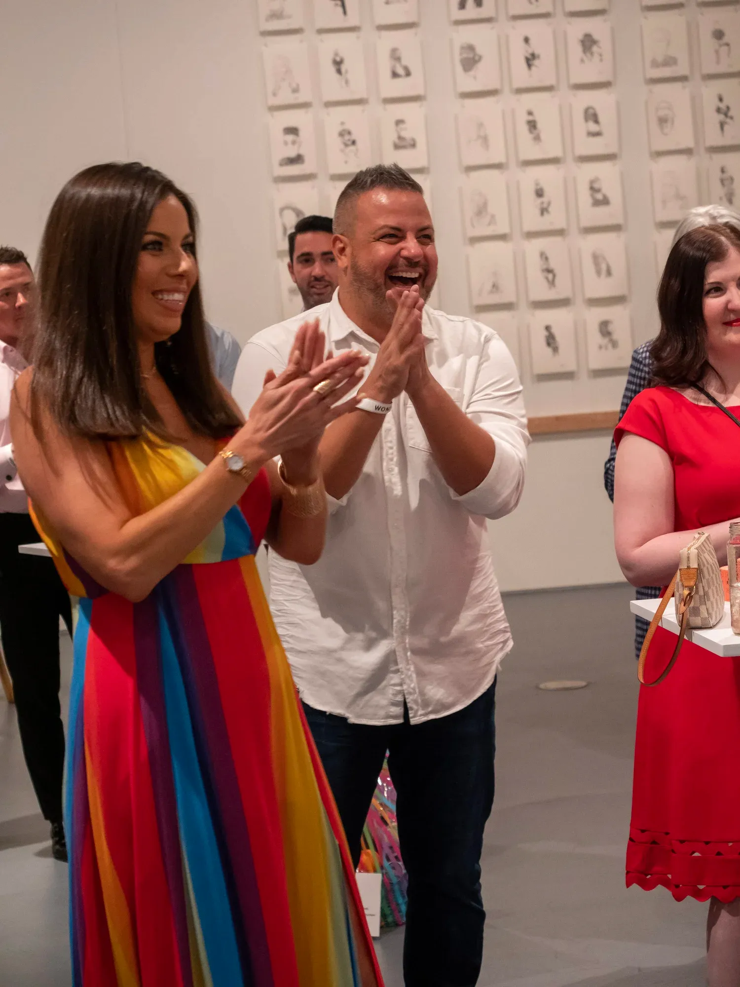 Guests enjoying artwork during a private gathering
